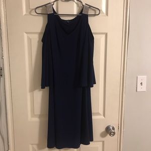 Navy dress with crystal details.